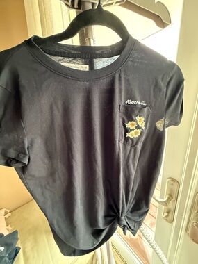 abercrombie kids black Tee with Yellow Daisy Pocket